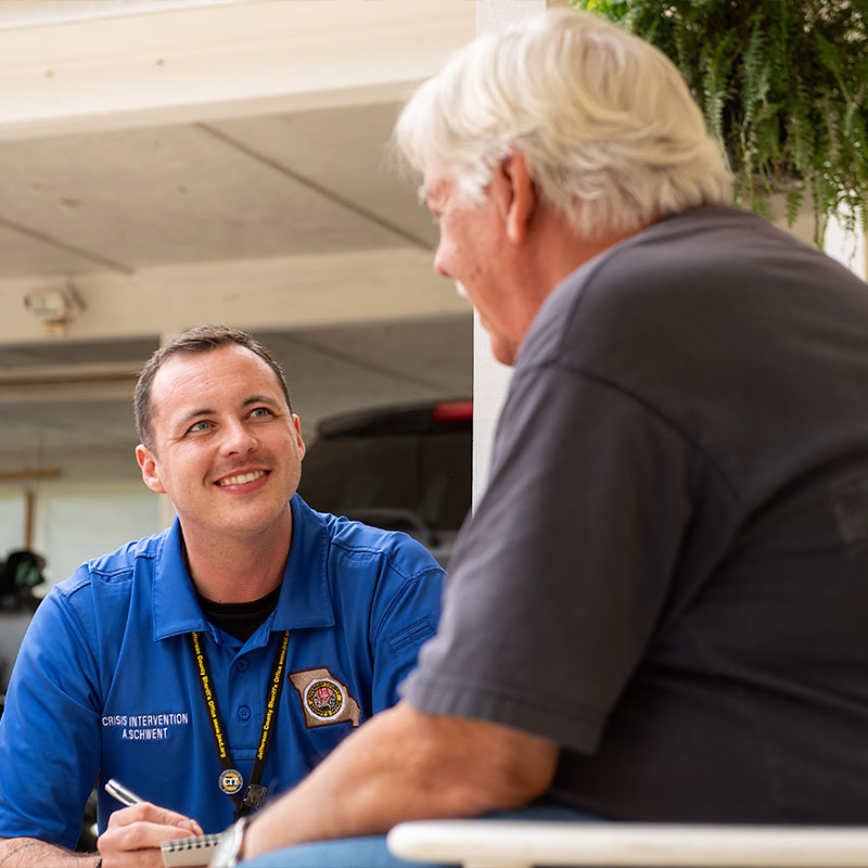 austin speaking with a citizen